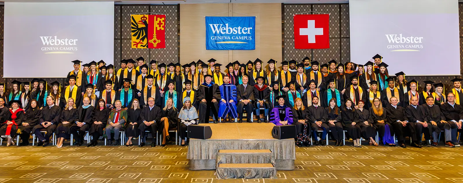 Webster Geneva Campus graduates pose in large group